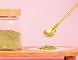 Green powder being spooned onto a Blate Pape Square