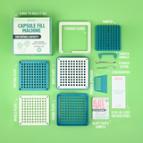 BlateCo Capsule Fill Machine components on a green background #color_teal